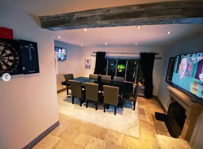 James Arthur's dining room is complete with a dart board and huge TV