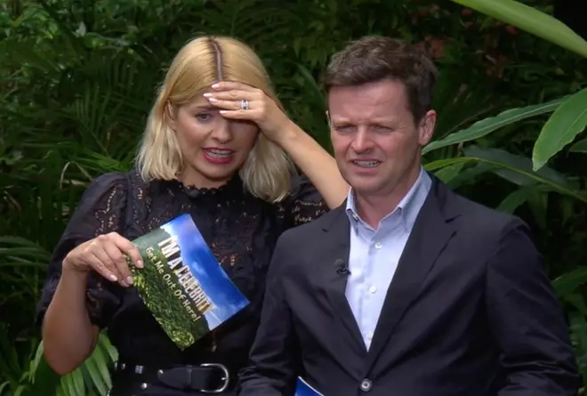Holly and Dec look on anxiously as Emily Atack undertakes 'viper pit'