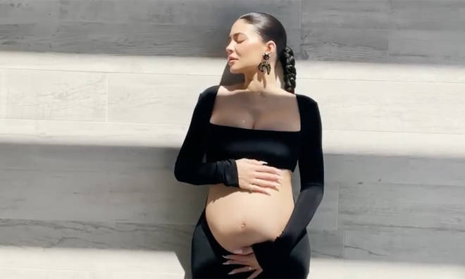 Kylie Jenner displayed her blossoming baby bump in the announcement video