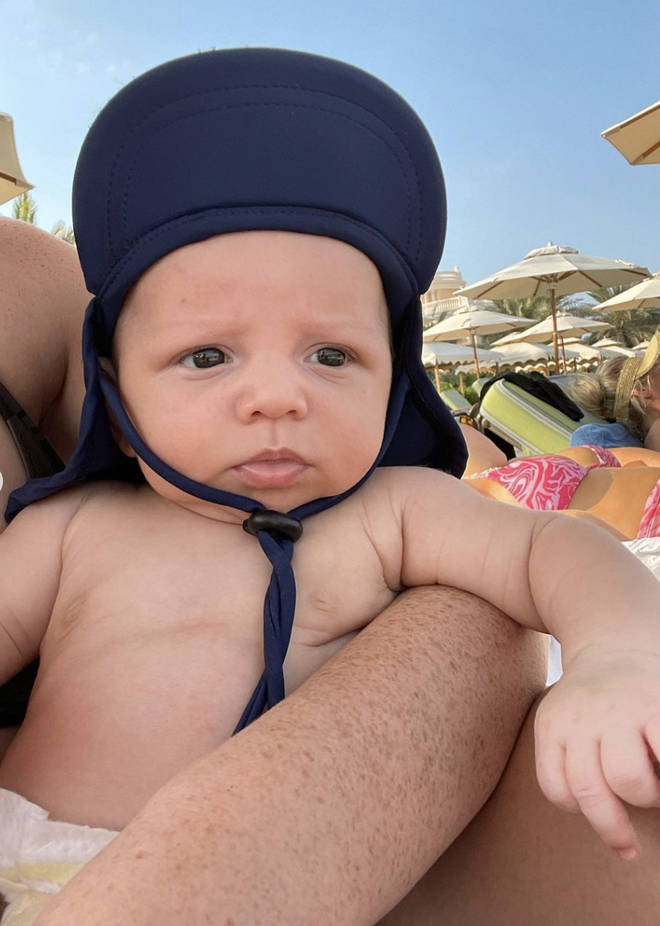 Perrie Edwards' son Axel enjoyed his first holiday