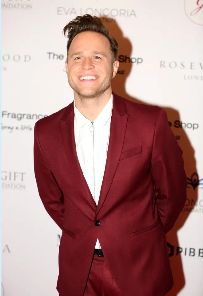 Olly Murs in a red suit