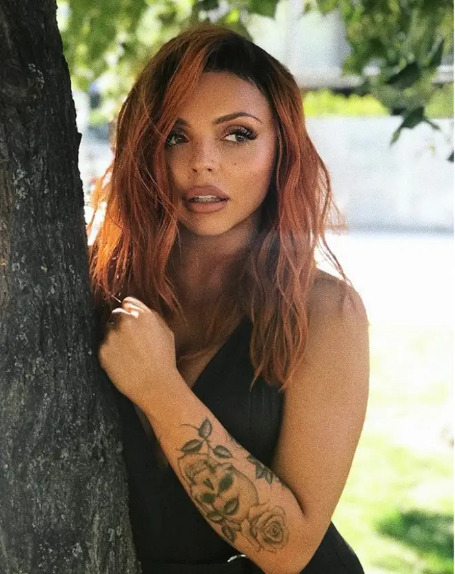 Jesy Nelson's rose and skulls tattoo