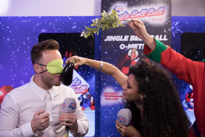 Olly Murs makes out with some vegetables at the Jingle Bell Ball 2018