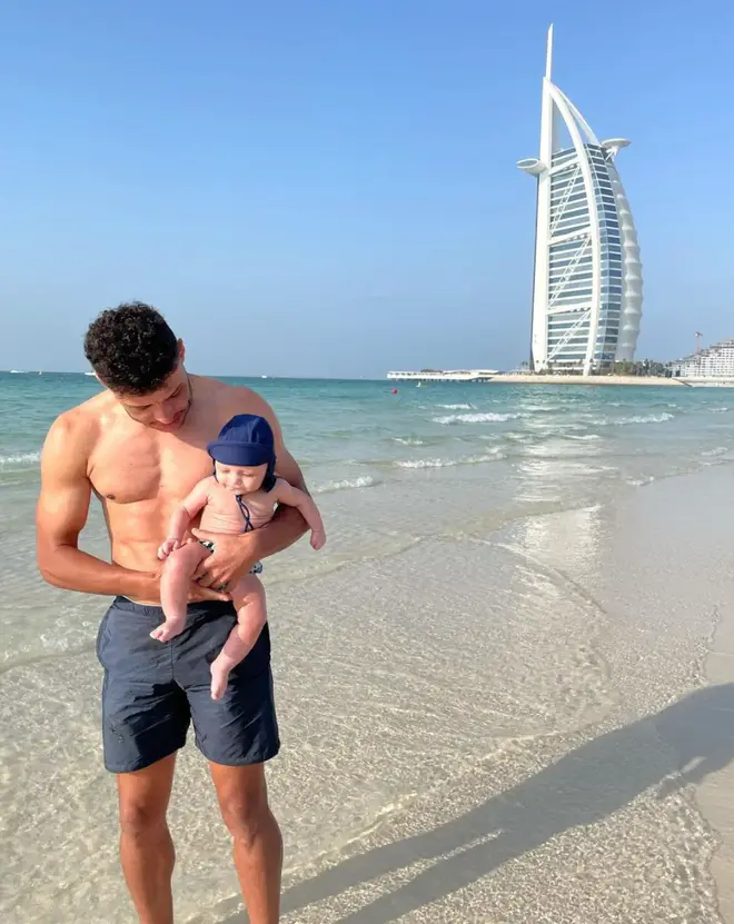 Alex Oxalde-Chamberlain had a dip in the sea with baby Axel