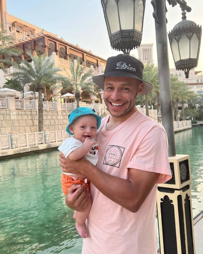 Alex Oxlade-Chamberlain with baby Axel