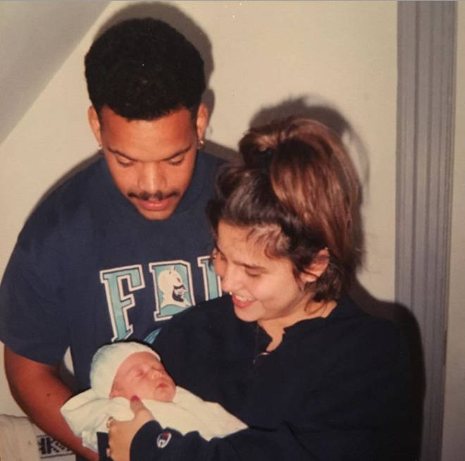 Halsey as a baby with her mum and dad