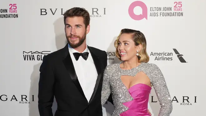 Miley Cyrus and Liam Hemsworth were happy to make red carpet appearances together