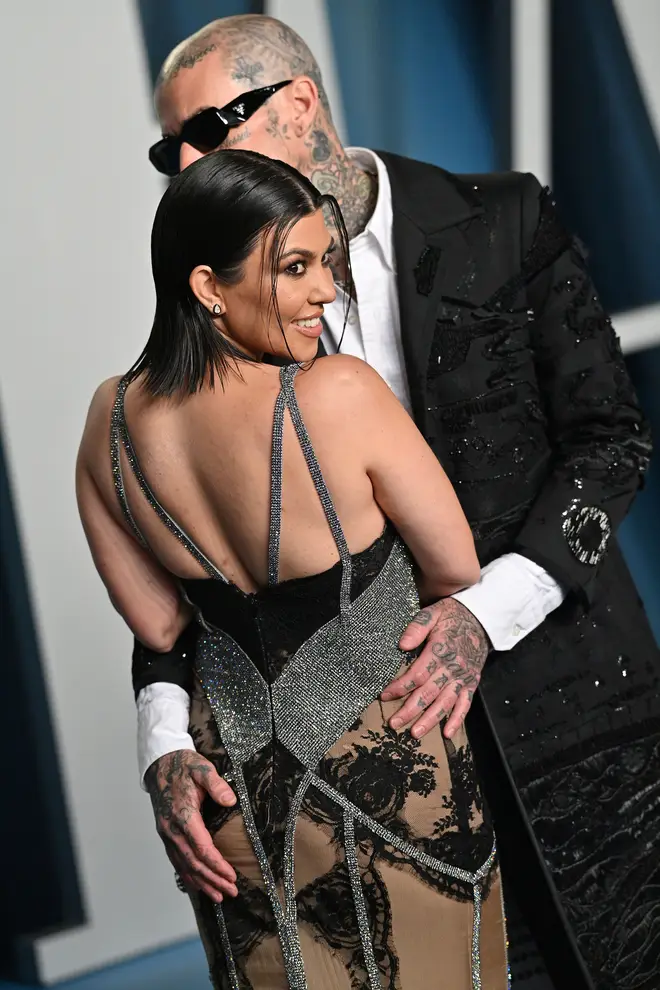 Kourtney Kardashian and Travis Barker at the Vanity Fair Oscar party
