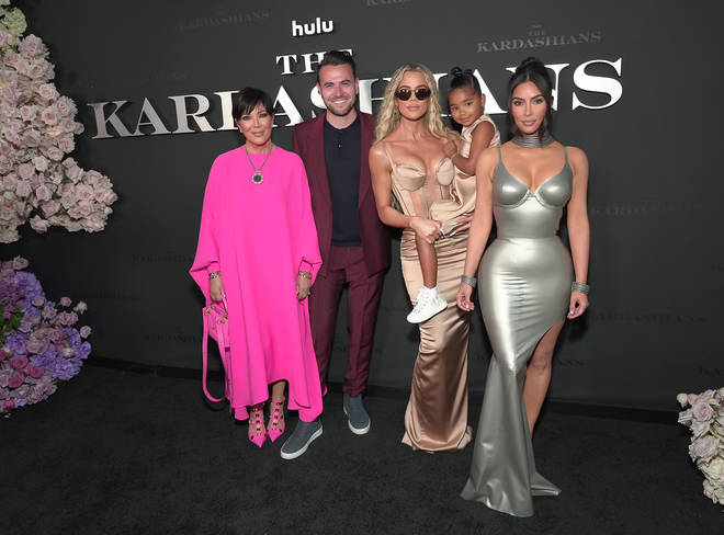 The Kardashians celebrated the launch of their new show [pictured with producer Ben Winston]