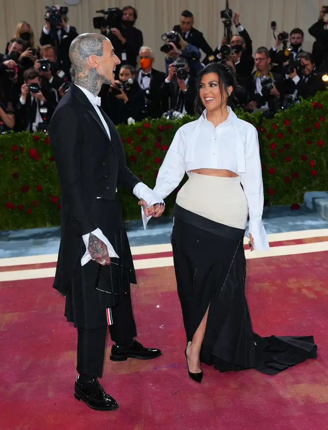 Kourtney Kardashian and Travis Barker wore his and hers outfits at the Met Gala 2022
