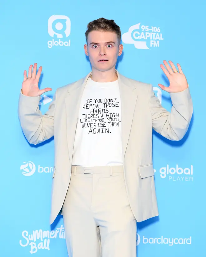 The TikTok star looked dapper as he dressed up a graphic tee with a cream suit
