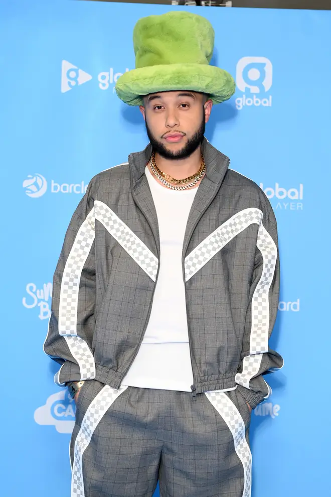 Of course, Jax Jones wore his staple hat to as he walked the carpet