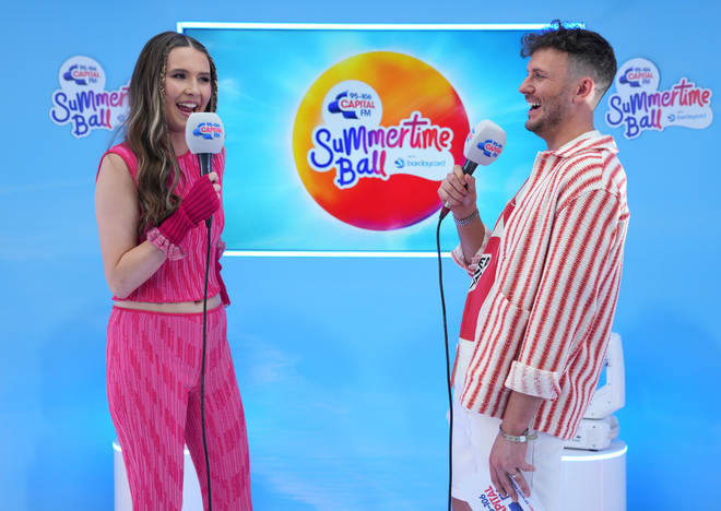 Mimi Webb speaks to Capital presenter Jimmy Hill backstage at Capital's Summertime Ball 2022.