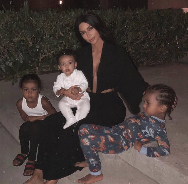 Kim Kardashian with three children, North, Saint and Chicago