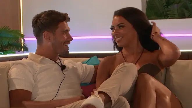 Paige Thorne and Jacques O'Neill talking on Love Island sofa