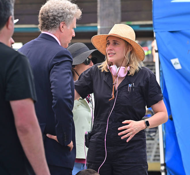Director Greta Gerwig chats with Will Ferrel between takes on set
