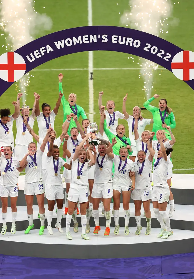 Leah Williamson and Millie Bright of England lift the UEFA Women’s EURO 2022 Trophy