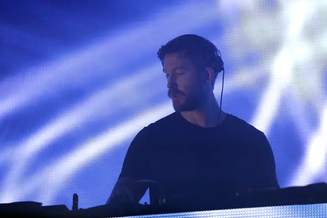 Calvin Harris called out a troll who accused him for being a "cash grab"
