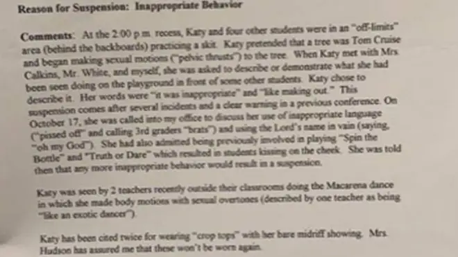 Katy Perry's report card from the 6th grade showing she was suspended for 3 days.