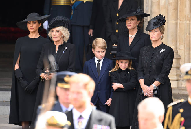 Prince George and Princess Charlotte stood with other senior royals as the Queen's coffin left Westminster Abbey