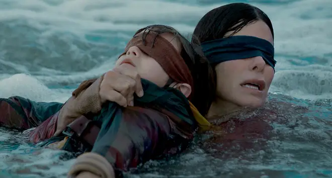 Malorie in the water with Boy in 'Bird Box'