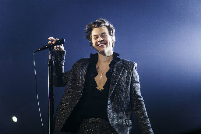 Harry Styles rocked a black glittery suit for his Paris leg of the tour