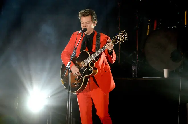 Harry Styles performed in a hot orange suit at a benefit concert in 2017