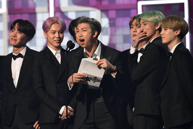 BTS made history as the first K-pop band to present an award at the GRAMMYs.