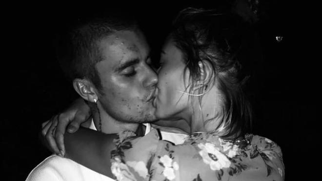 Justin Bieber and Hailey Baldwin cuddle and kiss in an Instagram phoot