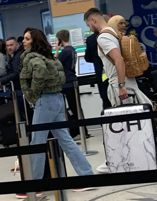 Jesy Nelson with Chris Hughes at London airport