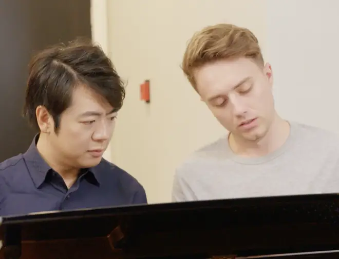 Roman Kemp and Lang Lang play the piano together