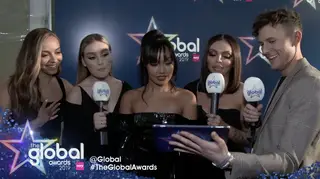 Little Mix chat to Jimmy Hill on the Global Awards red carpet.