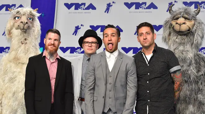 Fall Out Boy attend the VMAs with the llama puppets in 2017