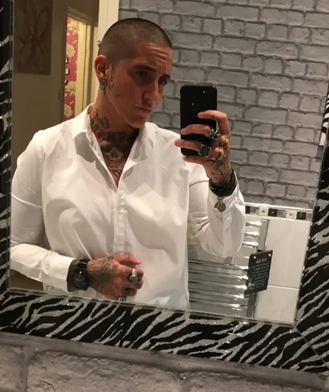 Natalie Phillips rocks those tattoos and the shaved head!