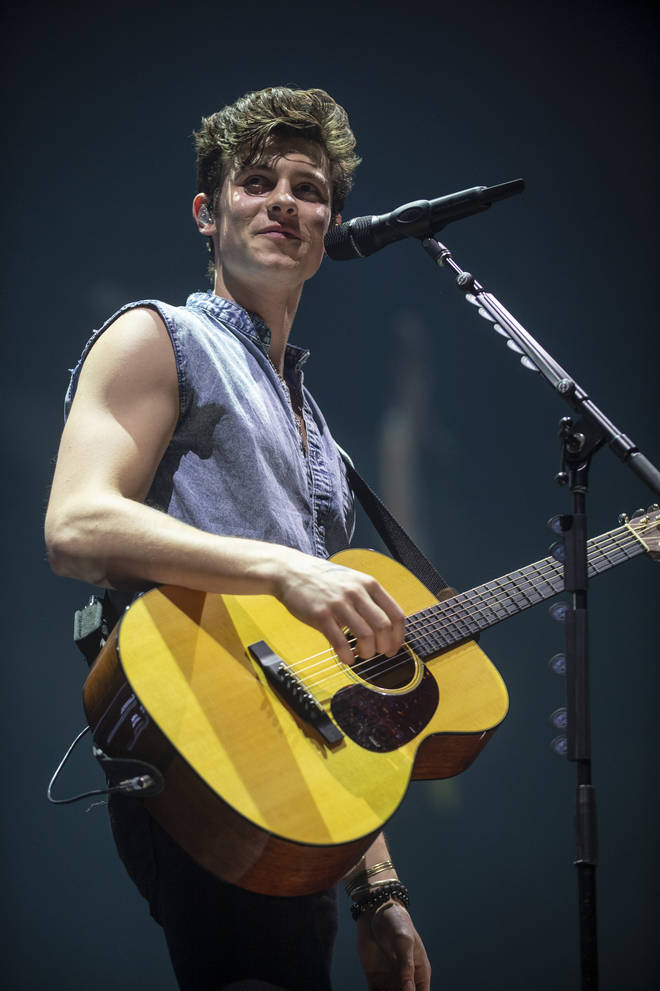 Shawn Mendes often performs in sleeveless shirts and vests