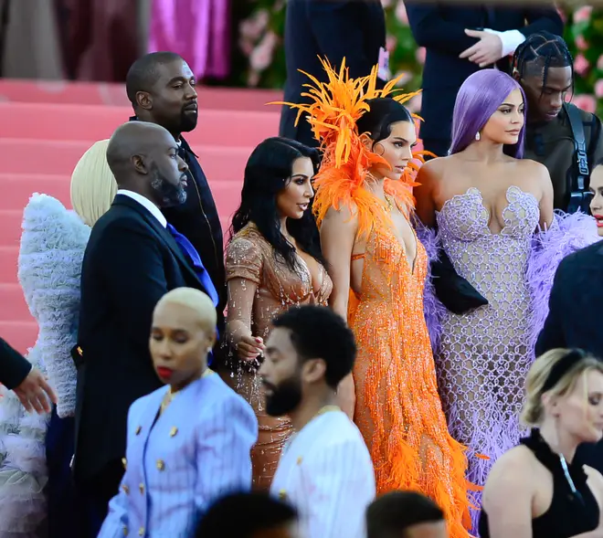Kim Kardashian poses with Kendall and Kylie Jenner, Corey Gamble, Kanye West & Travis Scott