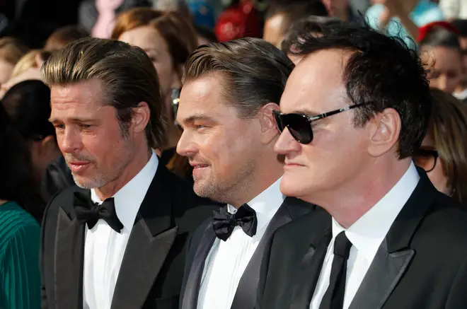Once Upon A Time In Hollywood co-stars, Leonardo DiCaprio and Brad Pitt recall meeting Luke Perry