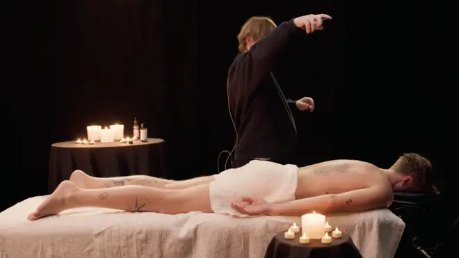 Lewis Capaldi making use of the oils mid-massage