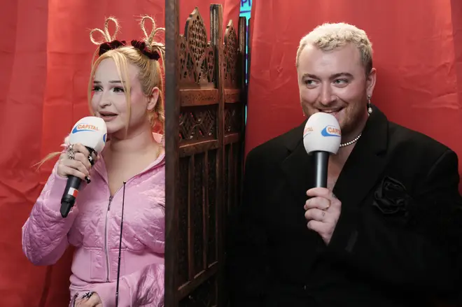 Kim and Sam play a game backstage at Capital's Jingle Bell Ball