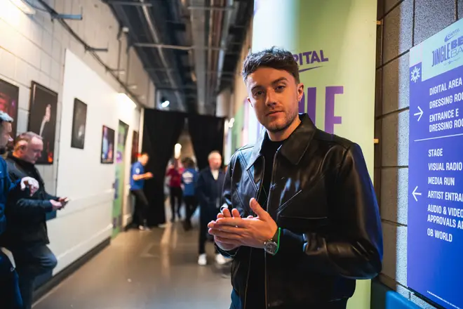 Roman Kemp chills before he introduces the artists