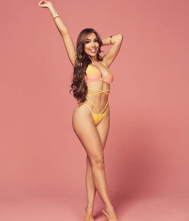 Love Island's Tanyel Revan in orange bikini for profile picture