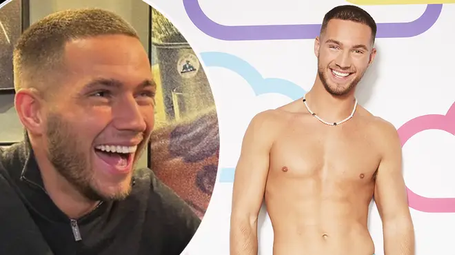 Ron Hall laughing and in swim trunks for Love Island promo