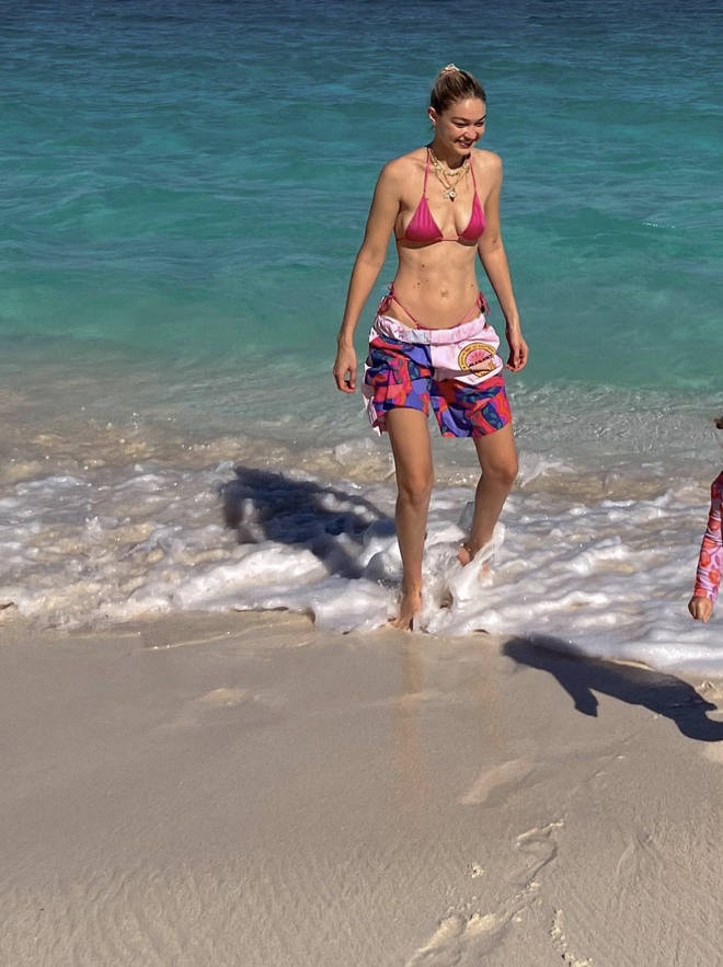 Gigi Hadid and Khai matched in pink swimsuits