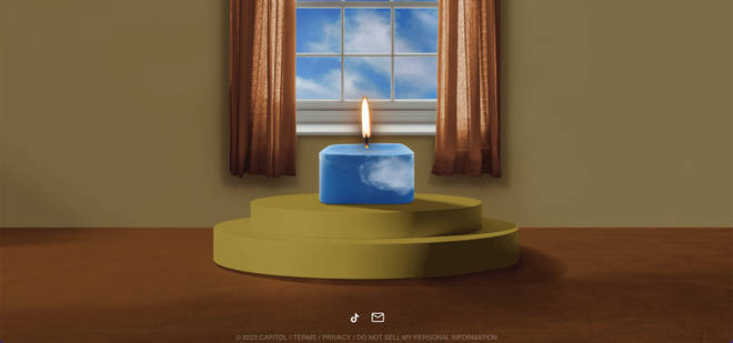 Heavenwontbethesame.com shows a cryptic candle in front of a window