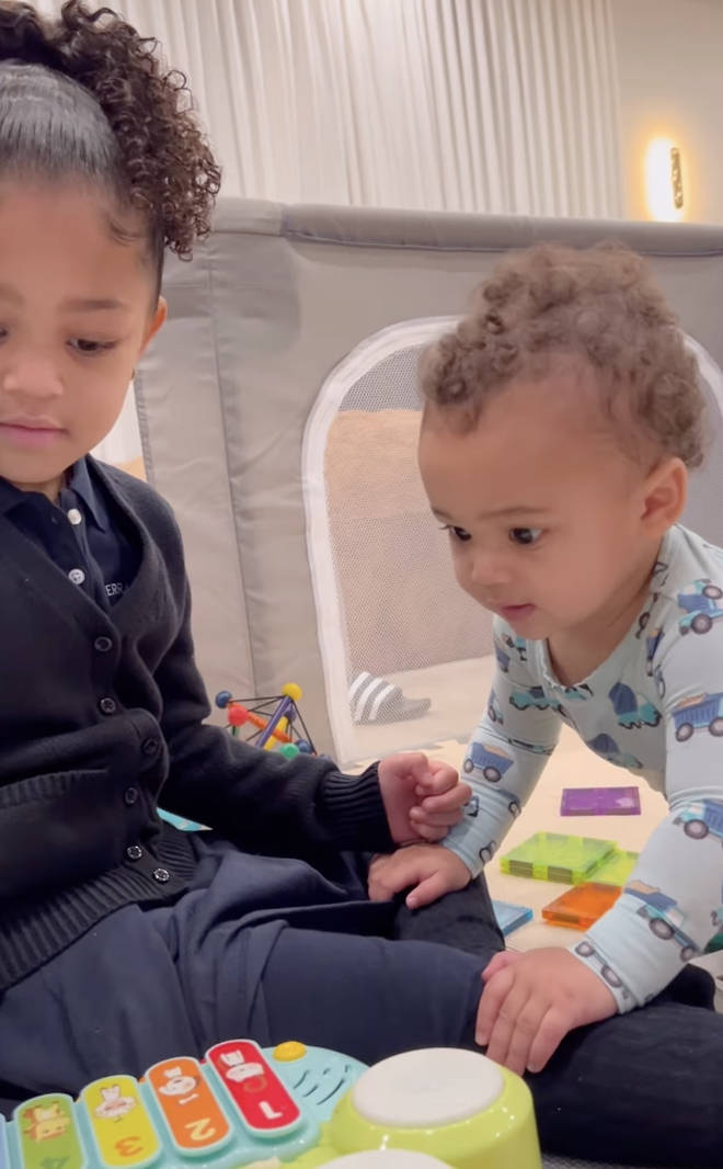 Aire and Stormi can be seen playing together in one of the clips