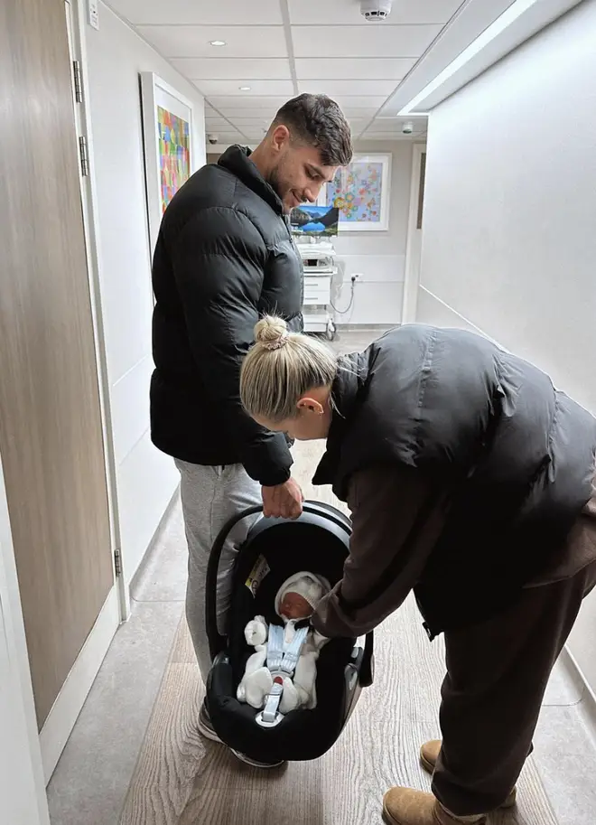 Molly-Mae and Tommy leaving the hospital with Bambi