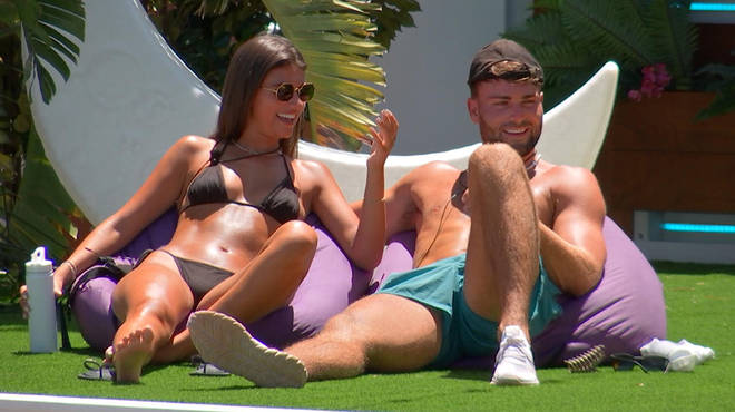 Samie Elishi sitting on the Love Island bean bags with Tom Clare