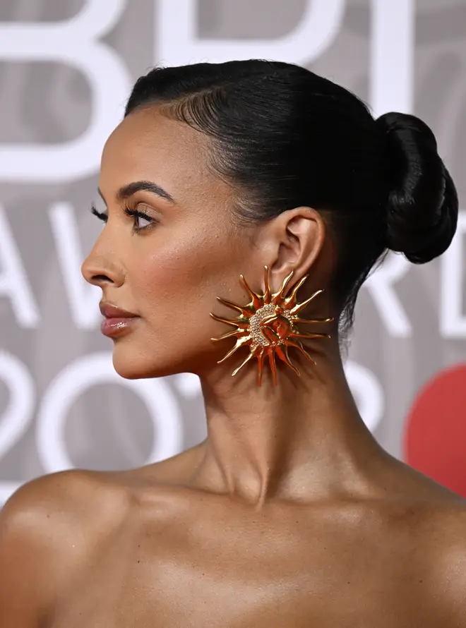 Maya stunned with golden make-up and statement accessories