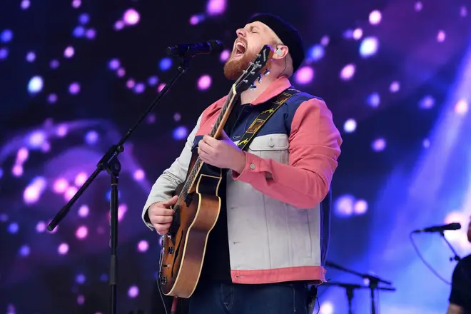 Tom Walker performing on stage at Capital’s Summertime Ball 2019