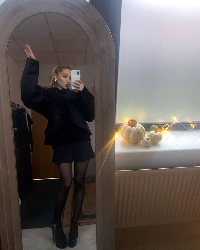 Ariana Grande is recording music as she shoots Wicked
